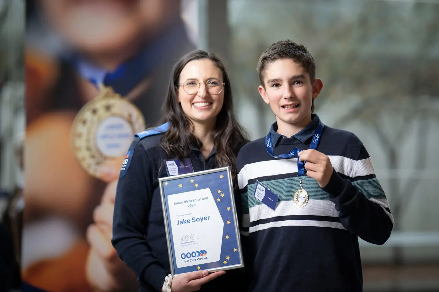 COURAGEOUS ACT: Triple Zero Victoria call-taker Leah Annunziata (left) nominated 11-year-old Jake Soyer for the award after observing Jake\\'s composure throughout the call. PHOTO: Gavin Blue Photography