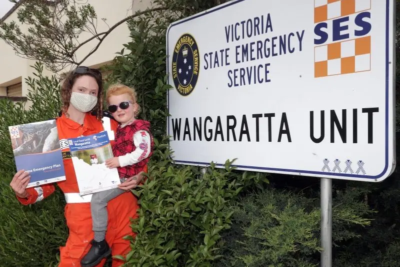 BE PREPARED: Wangaratta SES unit member Chloe Beel, with some help from three year old Bailey Miller, was spreading the flood preparedness message yesterday. PHOTO: Kieren Tilly