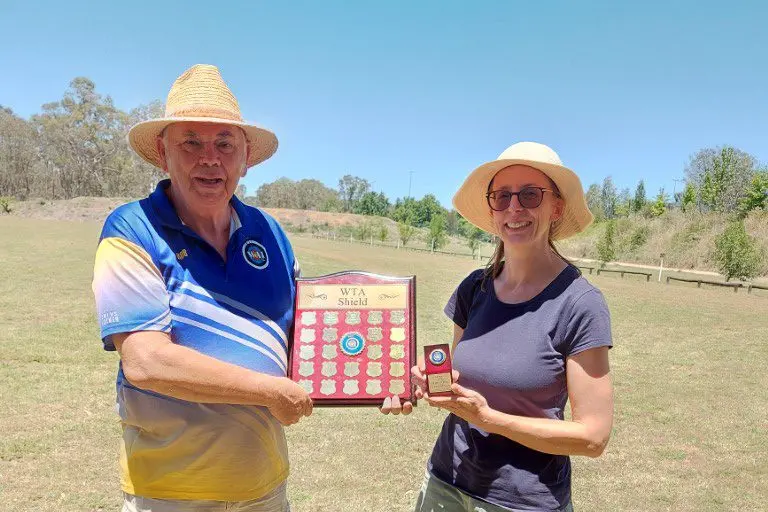 SHIELD WINNER: Lorraine Offermann (right) was presented the WTA Shield by club president Rob McEwan for taking out the handicap competition held across the whole year.