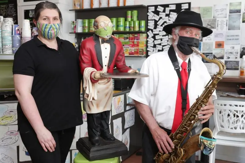 TUNING UP: Krystal Butler from the Butler\\u2019s Pantry in Reid Street and legendary local entertainer John Bisignano get into the spirit of the Wangaratta Jazz and Blues Festival which begins today. PHOTO: Kieren Tilly