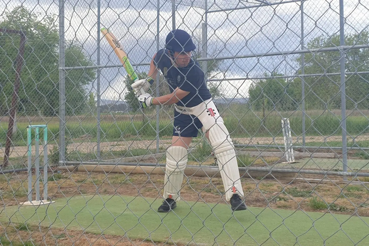FAST APPROACHING: Milawa\\'s Matt Gardner has a hit in the nets at his side\\'s training session on Friday evening. PHOTO: Nathan de Vries