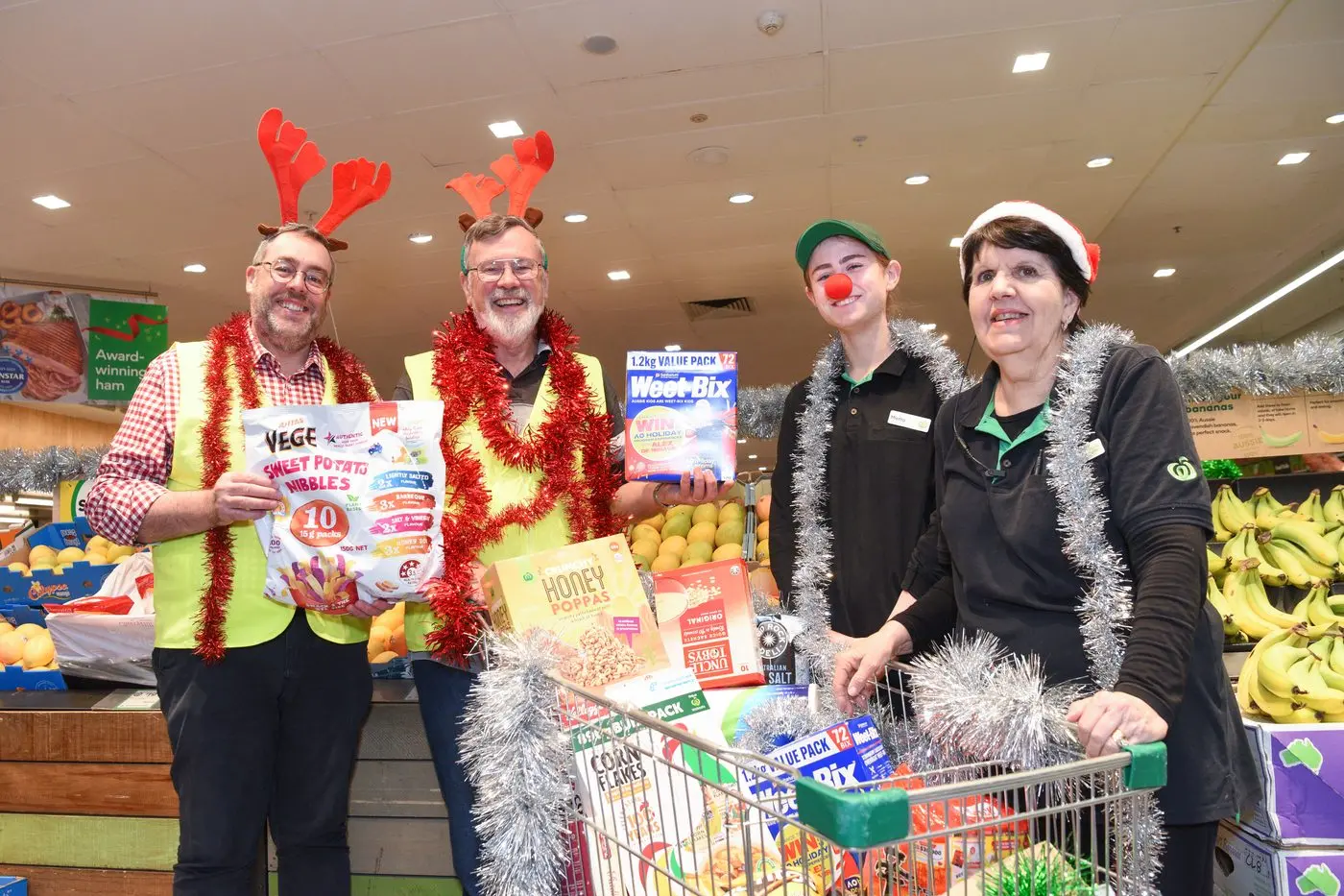 GIVING SPIRIT: David Still, David Price, Meitta Boyd and Wendy Edwards encourage the community to participate in the Grab a Grocery Campaign. PHOTO: Kurt Hickling