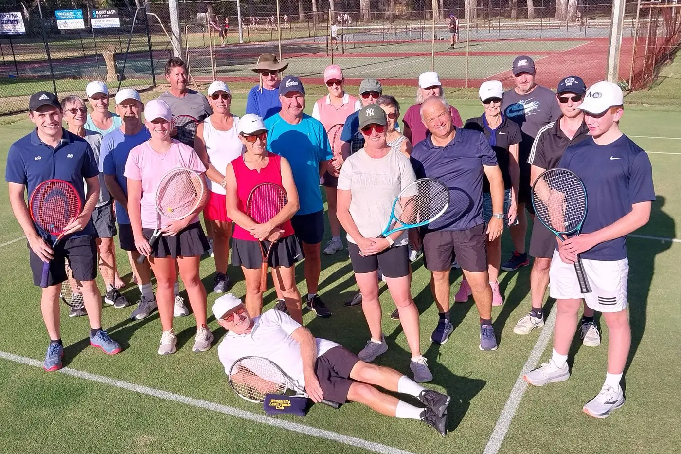 WELL PLAYED: The Monday and Tuesday twilight tennis crews - look carefully to see if you can see the regular players from both competitions.