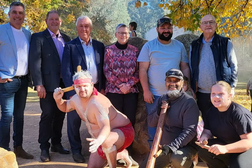 TOP HONOUR: The city\\'s Australian Citizen of the Year Ruth Kneebone (back, centre) was honoured with the unveiling of her carved handprint in the Marmungun Rock on Sunday. Pictured also are Mayor Dean Rees, Ovens Valley MP Tim McCurdy, Cr Harry Bussell, Jesse Cooper, Cr Harvey Benton; (front) Kevin Cooper,  Sonny Cooper, and Ellie Seymour. PHOTOS: Steve Kelly