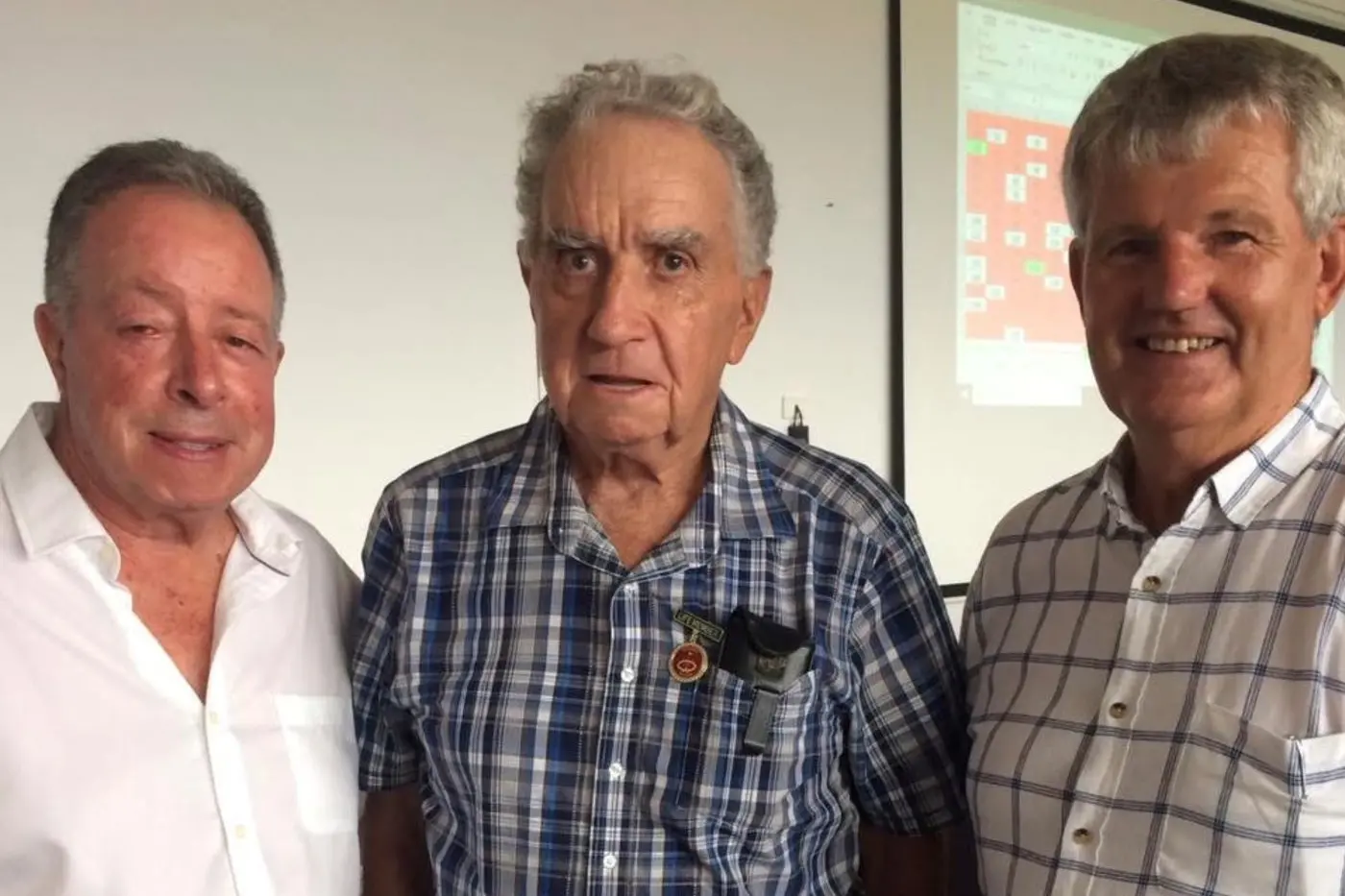 ALWAYS REMEMBERED: Whitfield and District Golf Club captain Greg Rosser (left) paid tribute to golf club life member Merv Porter (centre). Also pictured is Graeme Stanyer. 