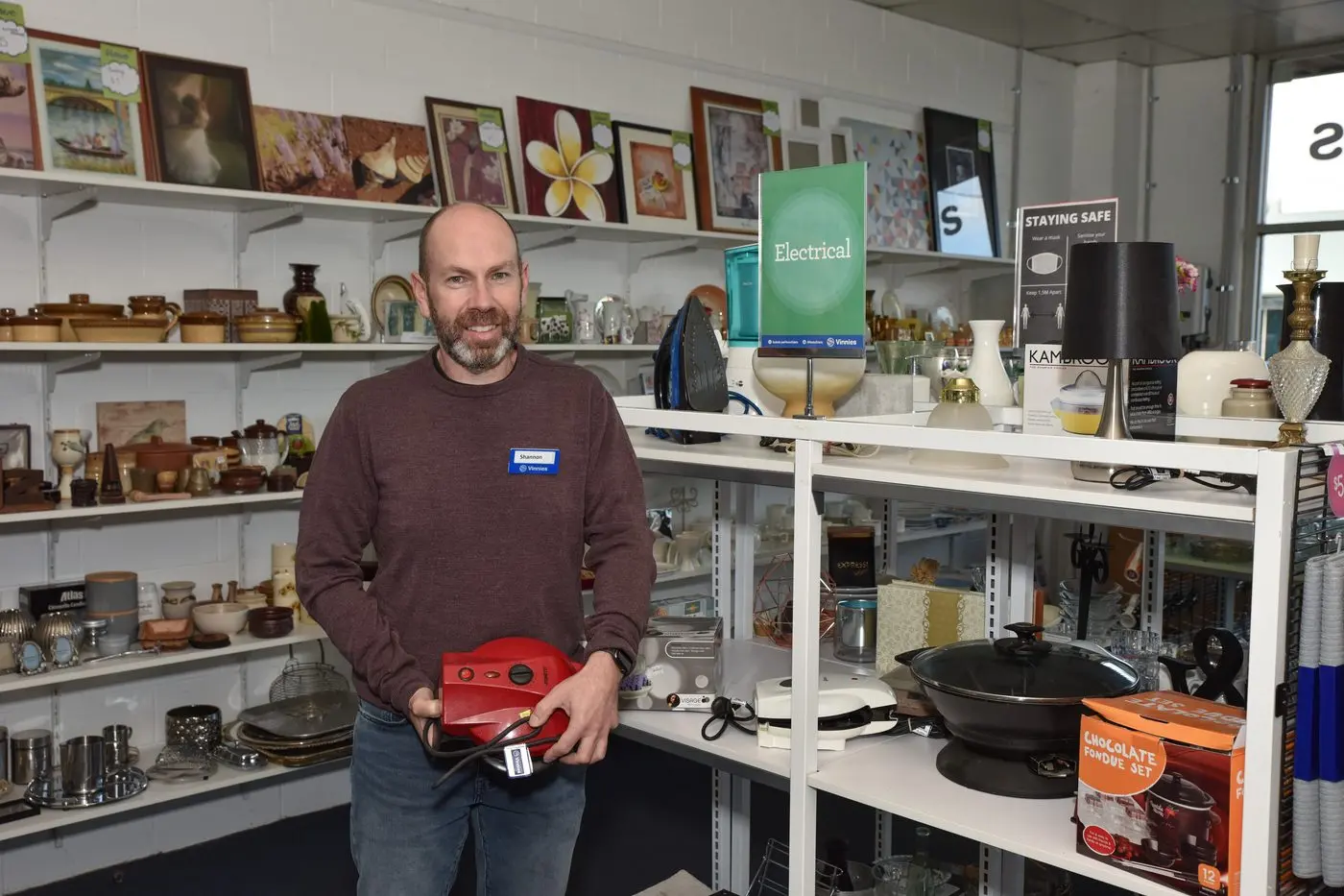 TESTED AND TAGGED: St Vinnies North East area manager Shannon Cole with one of the electrical appliances up for sale.  PHOTO: Kurt Hickling. Id:26294