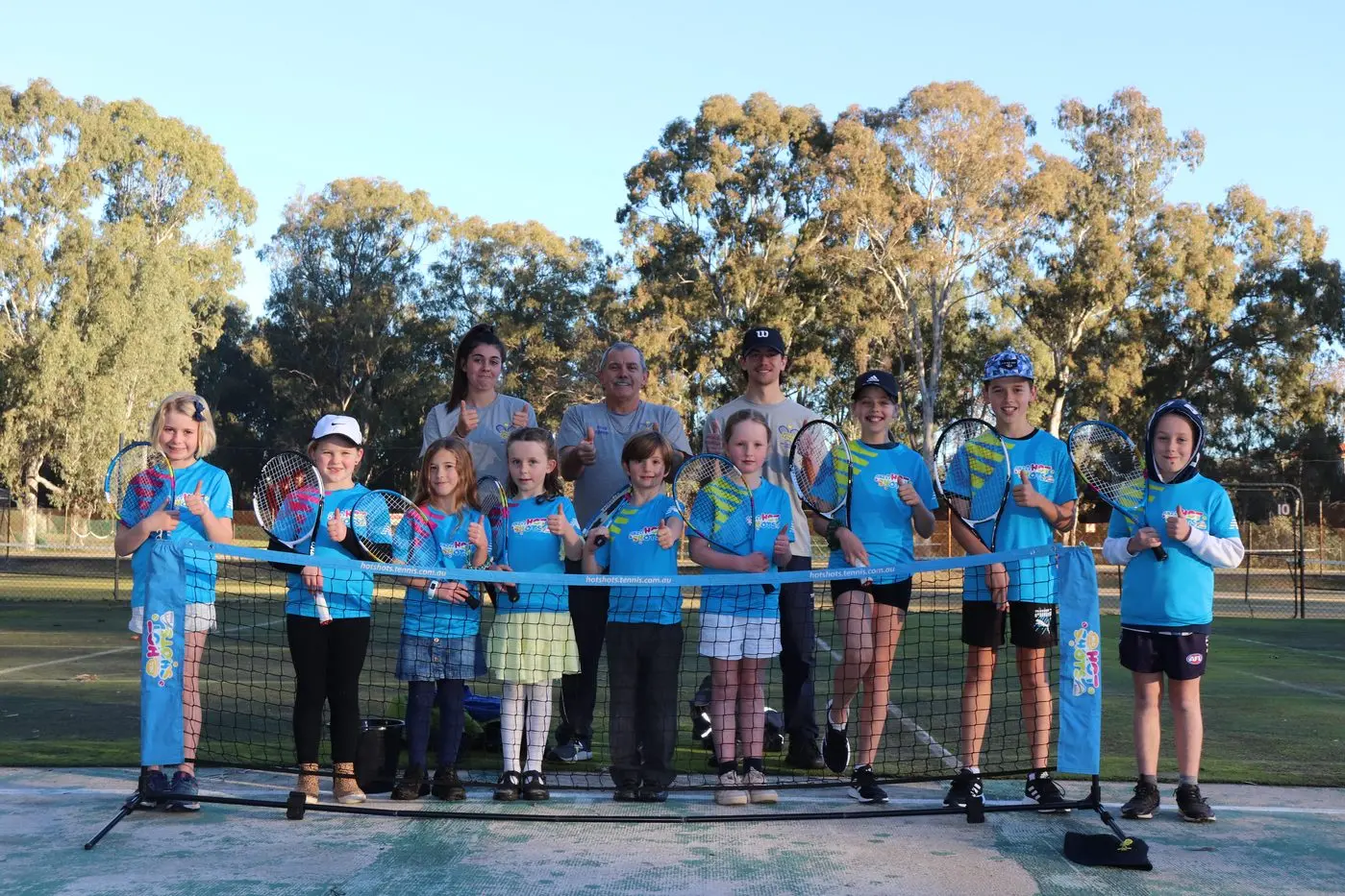 NURTURING TALENT: (Back) assistant coach Olivia Corso, head coach Douglas Smith and assistant coach Daniel Smith with (front) Wangaratta Lawn Tennis Club Hotshots players Phoebe Read, Stella Reid, Alexandra Wallace, Matilda Ginnivan, Charles Hodge, Scarlett Clancy, Elise Costa, Nathan Costa and Jack Ginnivan.