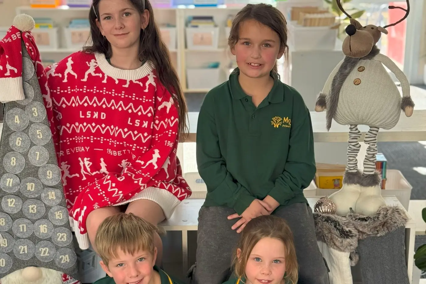 FUN AND GAMES: Moyhu Primary School students including (back) Ellie Evans and Ada Beckett-Tatt with (front) Ollie Cheong and Collins Sloan, are looking forward to celebrating Christmas in July at the school\\'s trivia night. PHOTO: Sarah Patterson