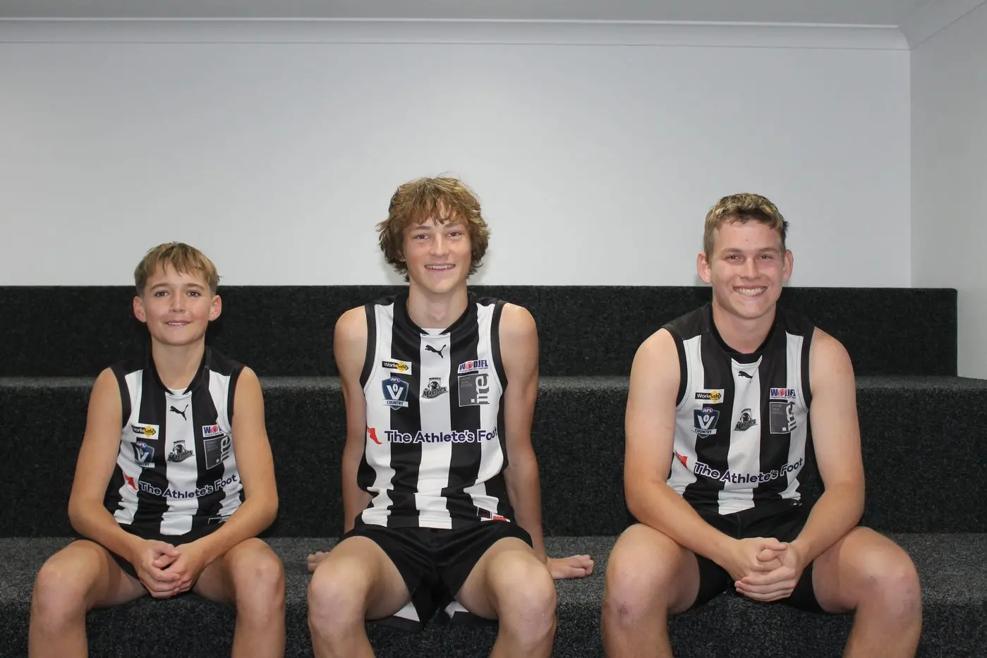 NEW SURROUNDS: Junior Magpies under 14 captain Harry Allan and under 17 co-captains Jonnie Wohlers and Riley Burrows have found lots to like about the upgrade to the changerooms at the Wangaratta Showgrounds. PHOTO: Jordan Duursma