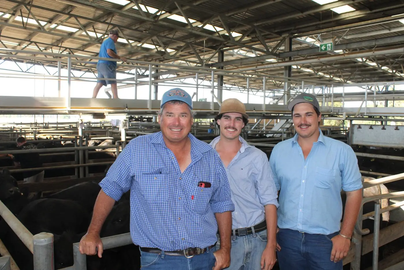 FAMILY BUSINESS: Cattle farmer Simon Ballentine and his sons, Aaron and Ryan, were pleased with their outcome at Friday\\u2019s Blue Ribbon sale at the Wangaratta Stock Exchange. PHOTO: Bailey Zimmermann