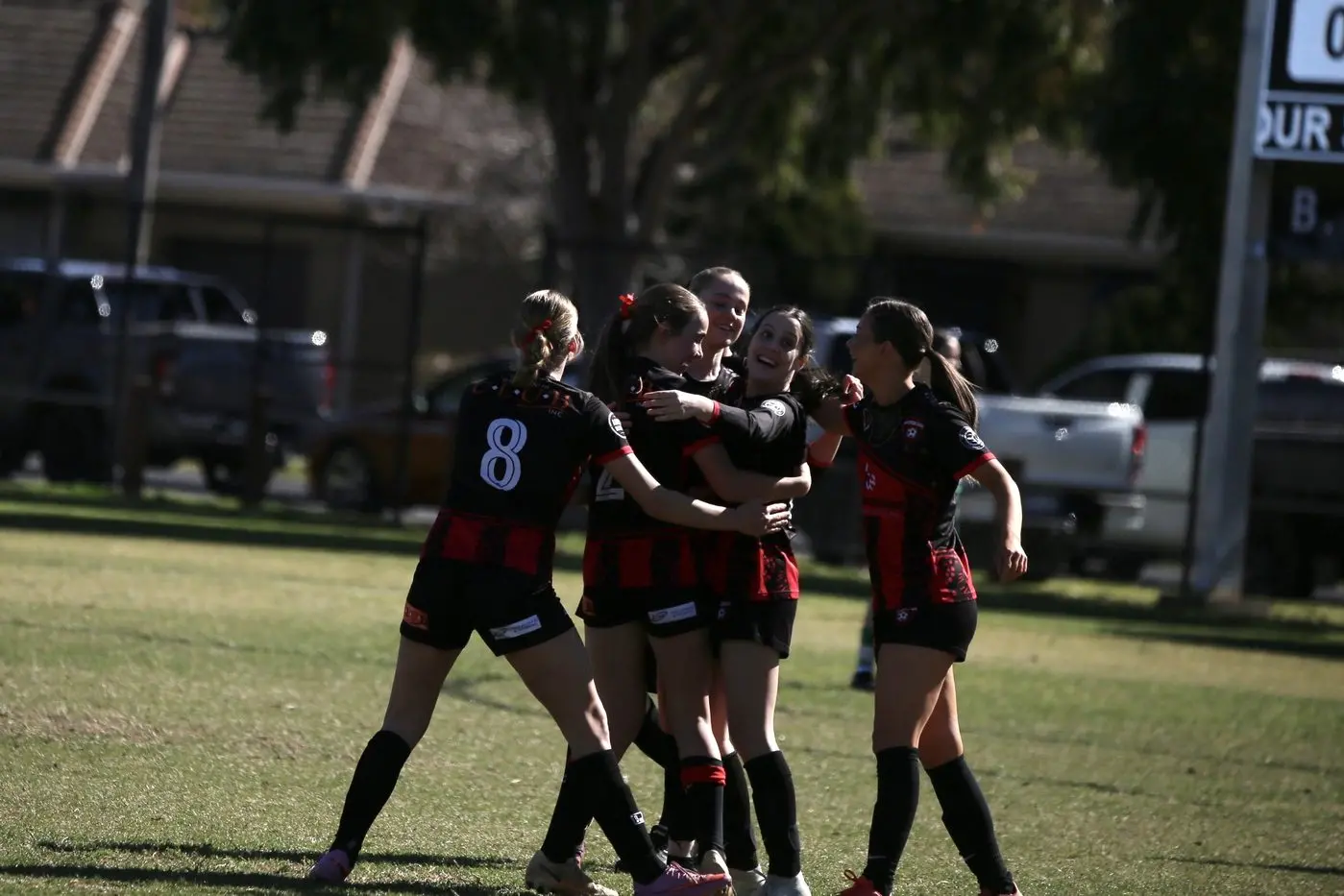 PURE ELATION: The Lady Devils celebrate their 3-0 win over Albury United on the weekend. PHOTOS: Kat De Naps Photography