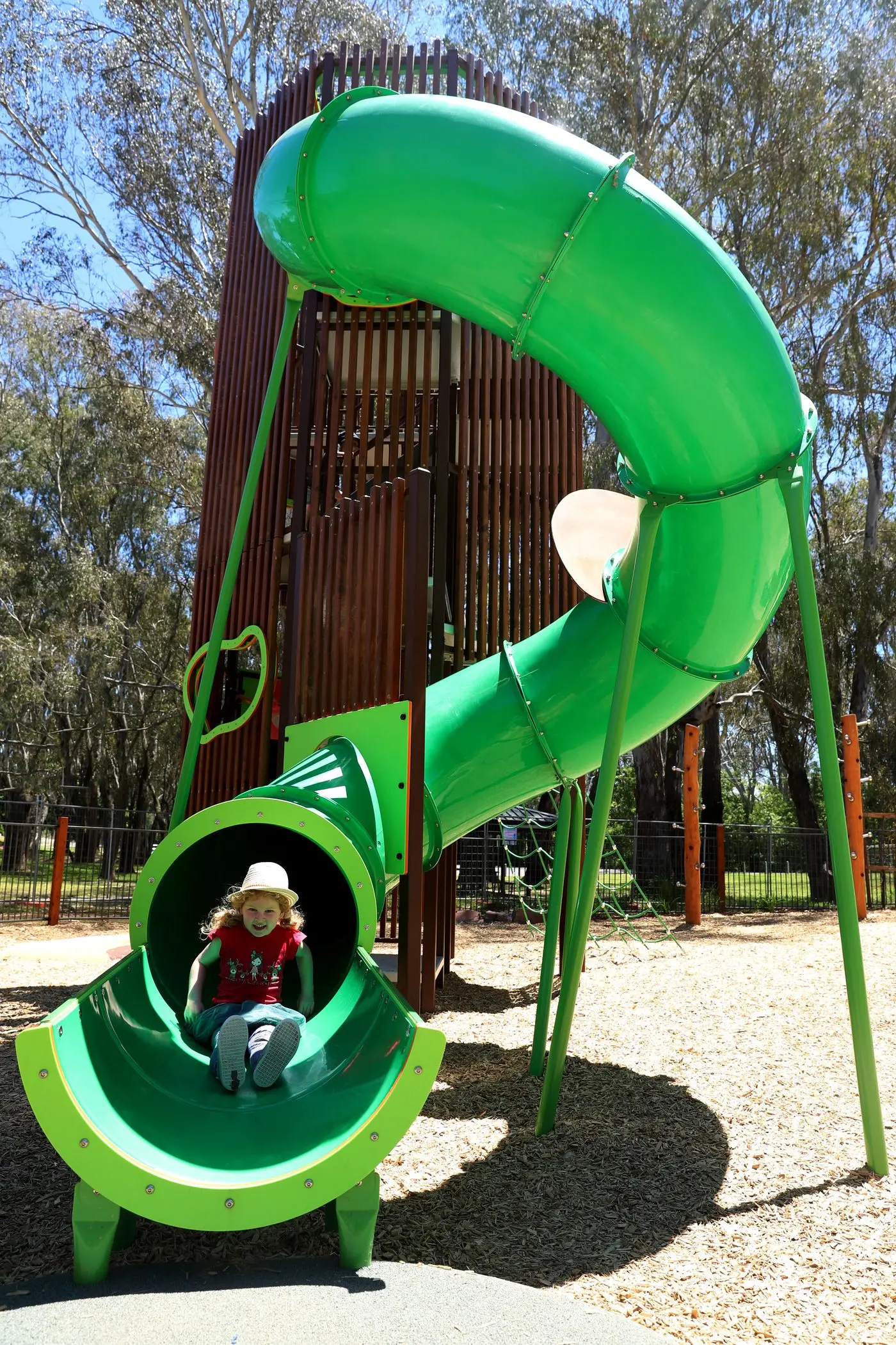 SLIDE: Eliza Cashman tries out the new slide in the fully rebuilt playground that is the first component of a $1.5 million rejuvenation of Wangaratta\\'s Apex Park. PHOTO: Nick Richards