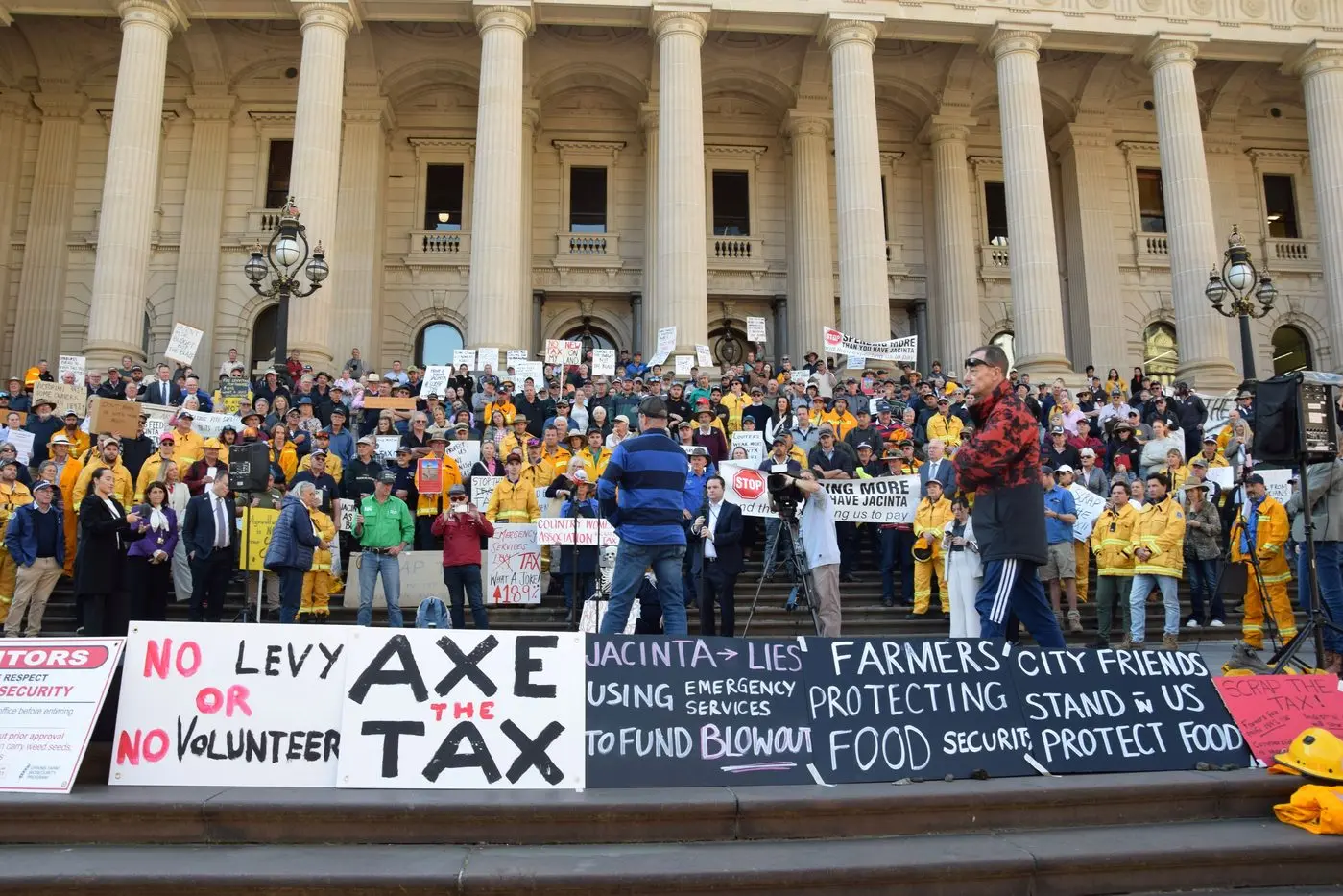 COMMUNITY PROTEST: Last month, about 400 volunteers and farmers rallied on the steps of the Victorian Parliament to protest the Emergency Services and Volunteers Fund. PHOTO: Andy Wilson