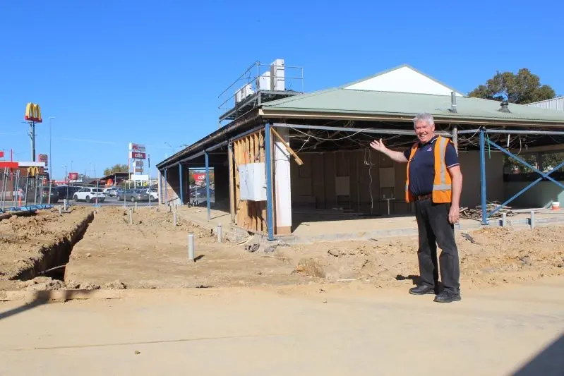 PROGRESS: APCO store manager Brett Anderson is excited about the new upgrades being made to the Wangaratta store. INSET: The plan of what the finished product will look like.