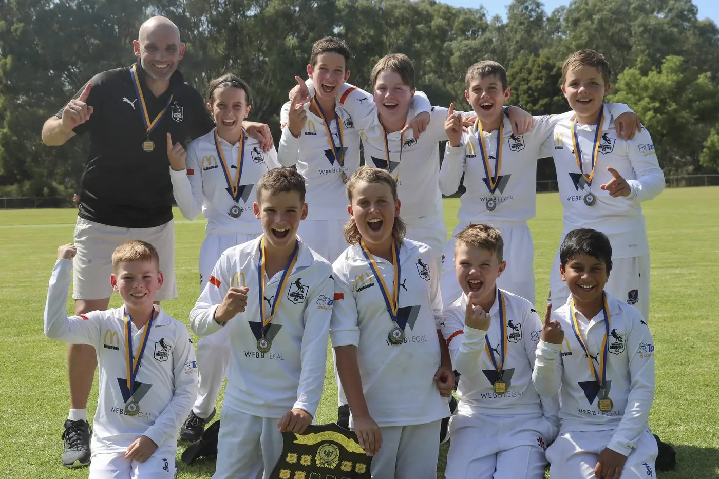 WINNERS: The winning u12s Wangaratta Magpies Black team, (back L\\u2013R) Luke Sims (coach), Taite Sims, Sam Reid, Joel McNeil, Harry Edwards, Thomas Fieldew; (front L\\u2013R) Hudson Membrey, Lenny Sims, Oscar Edwards, Logan Benton and Kavish Singla. . PHOTO: Melissa Beattie Id:21876