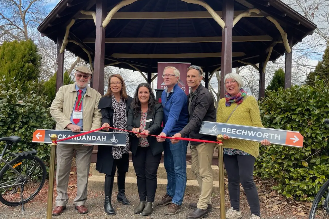 OFF TO THE RACES: Graham Brown, Jaclyn Symes, Mayor Sophie Price, James Lacey, Luke Woodford and Barbara Martin officially opened the Beechworth to Yackandandah Rail Trail on Wednesday.