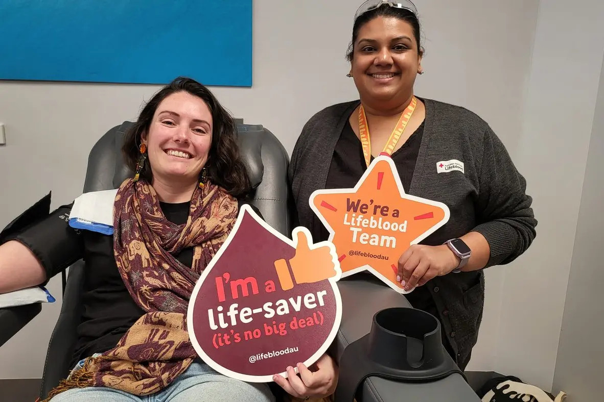 YOUR HELP IS NEEDED: Donor Kat Megens with registered nurse Bianca Fernandes encourage people to book in for a appointment today. PHOTO: Steve Kelly