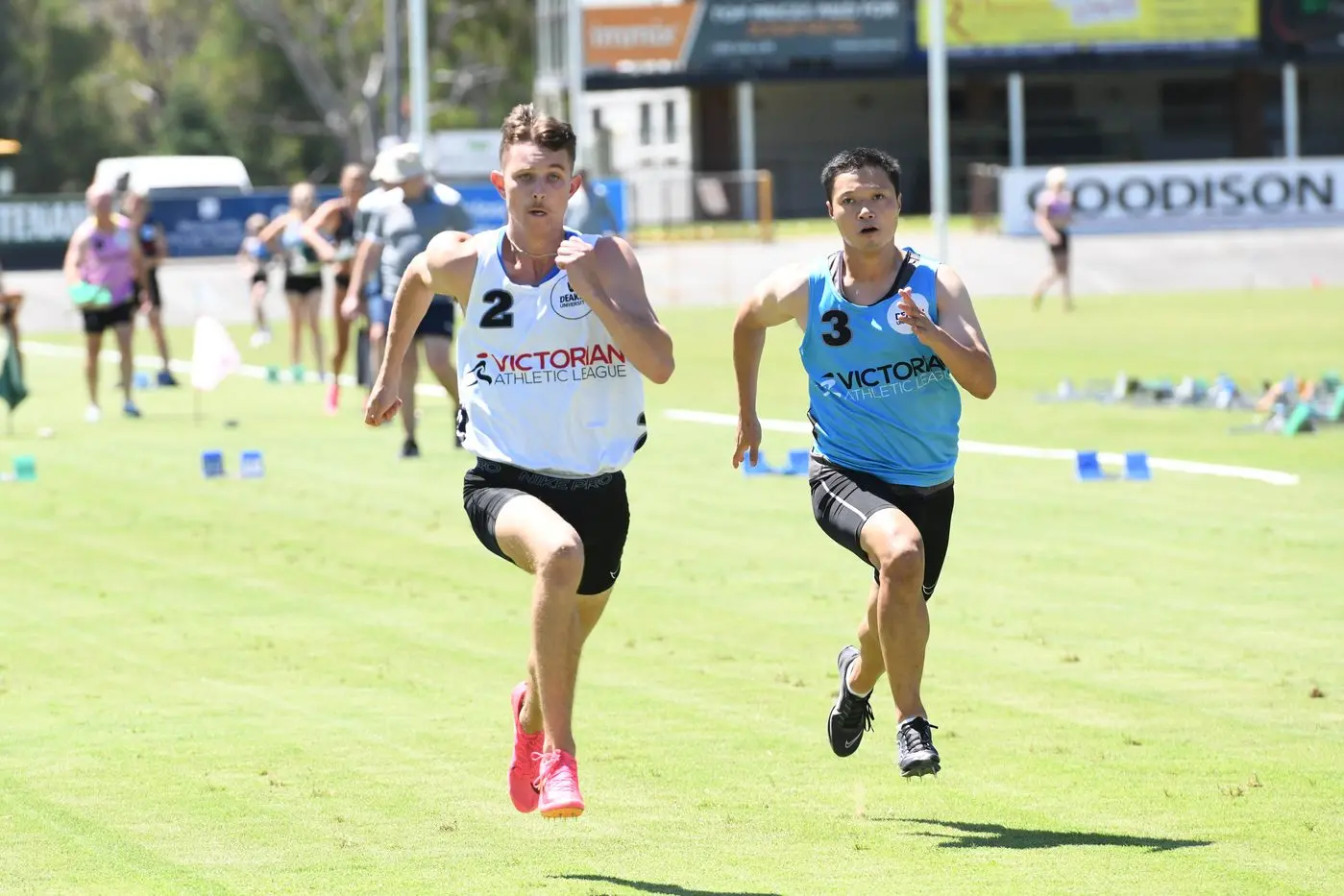 IN STRIDE: Lachlan Shanks (left) bursts ahead of Geoffrey Lam during the 70m Restricted heats on Saturday afternoon. PHOTO: Kurt Hickling
