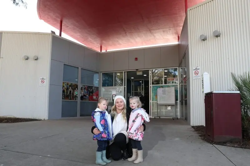 SHATTERED: Bailey White with daughters Daisy and Scarlet Edgar were diappointed to hear the creche was closed. \\nPHOTO: Kieren Tilly