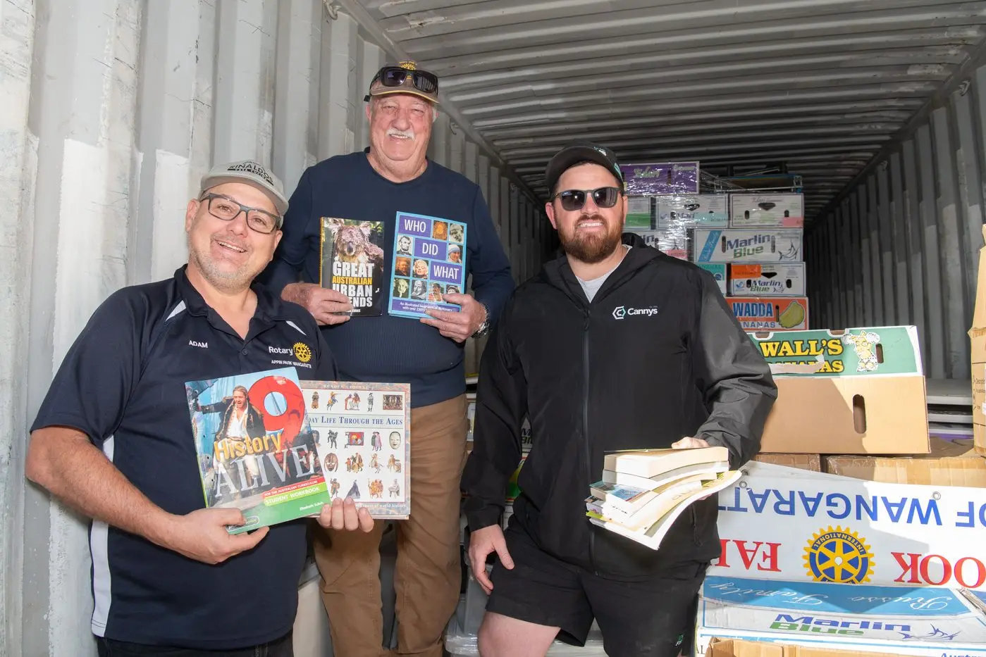 BOOKS GALORE: Rotarians Adam Pizzini and Keith Snowdon, with Jai Canny from Canny\\'s, have plenty of stock ready to go for the Wangaratta Book Fair on the June long weekend. PHOTO: Kurt Hickling