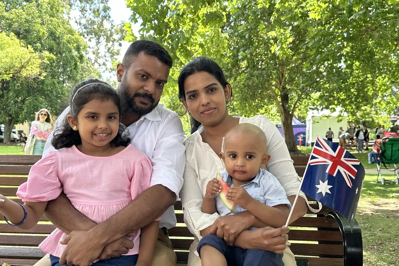 HAPPY AUSTRALIANS: Prejith Prasad, Anitha Radhakrishna and children Dashka and Daven Prejith Nair were enjoying the Australia Day festivities Friday morning as Prejith, Anitha and Dashka received their Australian citizenships. PHOTO: Bailey Zimmermann