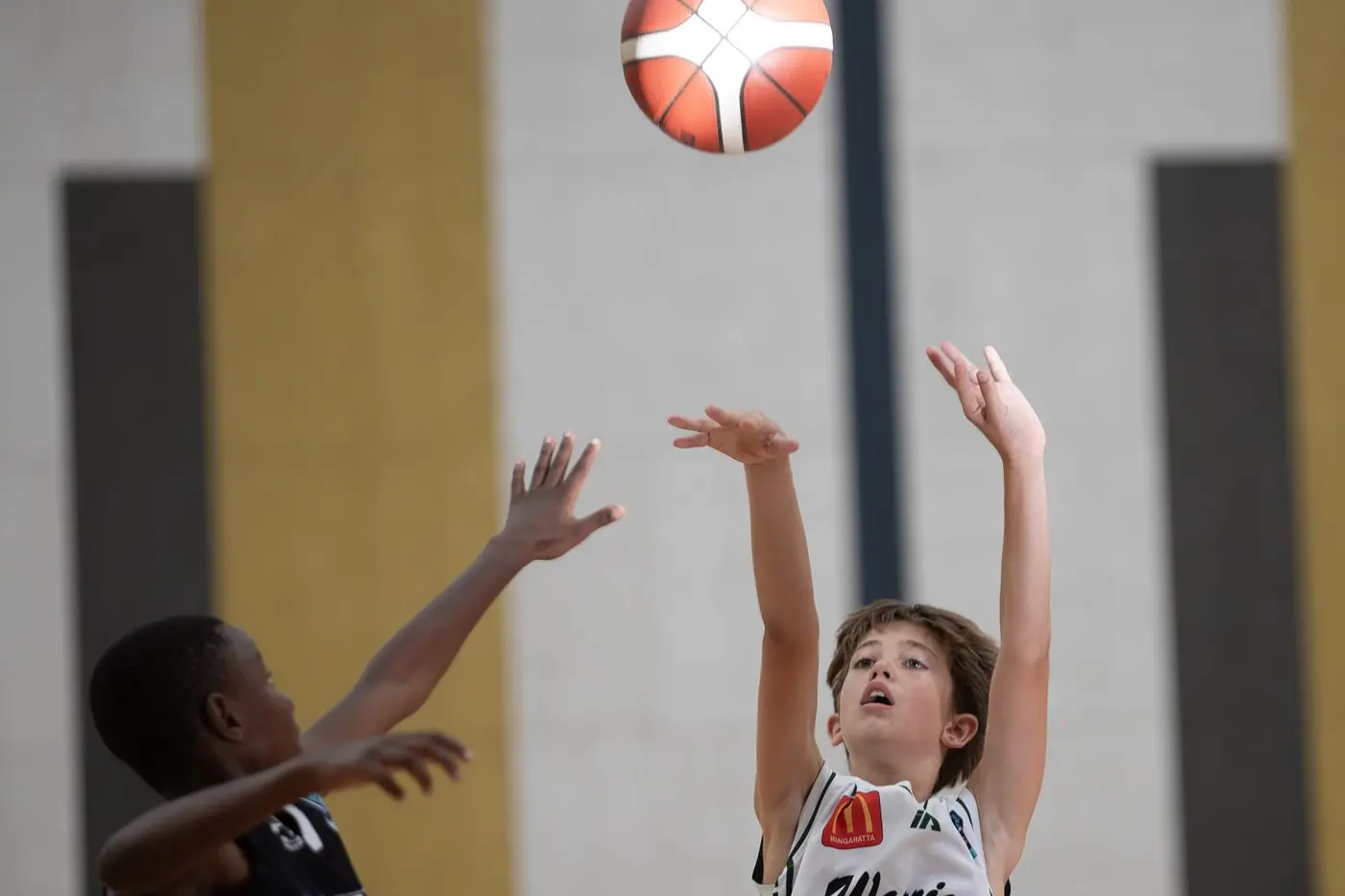 SHINE SHOT: Under 16 player Elijah Kain\\'s shot catches the light perfectly in his match on the weekend. PHOTOS: Melissa Beattie