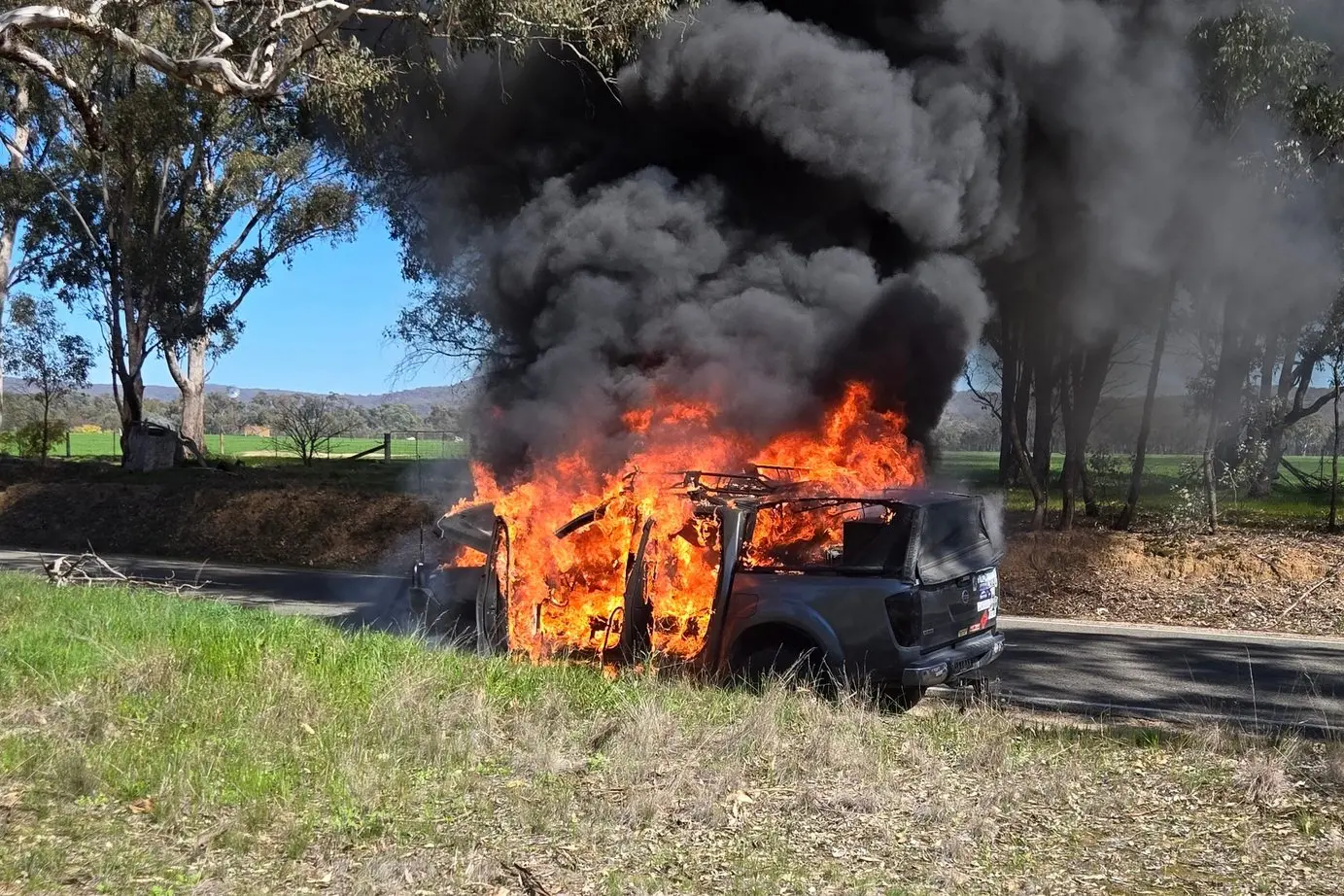 FIRED UP: Brendan Crook\\'s Nissan Navara engulfed in flames on Wangaratta-Yarrawonga Road.