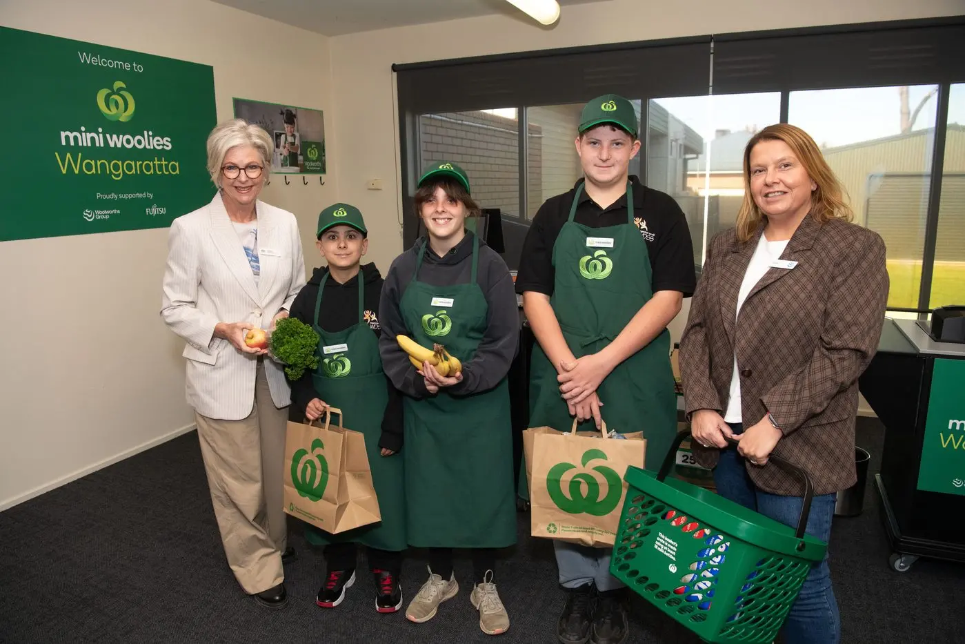 SHOPPING: Indi MP Helen Haines (far left) and Woolworths chief risk officer Carly Richards (far right) join WDSS students Levi Jago (left), Lily Whalley and Charlie Blake in the Mini Woolies initiative. PHOTOS: Kurt Hickling
