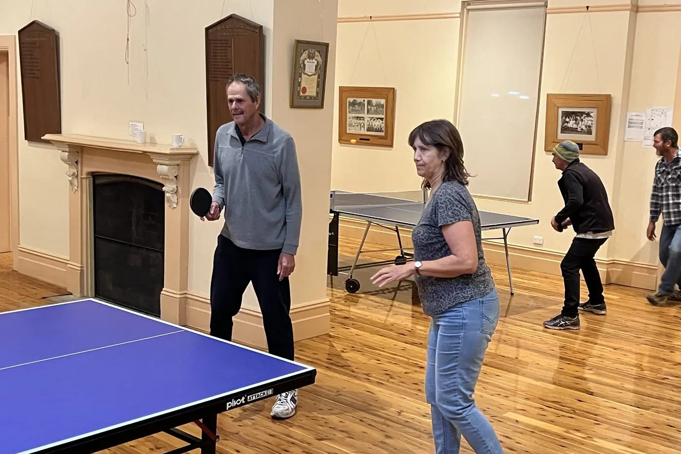 THE WALL: Gary Coad and Sharene Gervasoni prepare to return a serve.