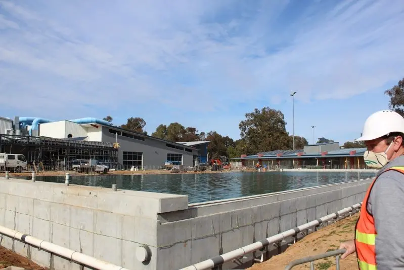 WATER TIGHT: Aquatics project manager Allan Thrum inspects the filled 50 metre outdoor pool on Monday morning. Some 2,247,000 litres of water has been pumped into the pool tank to test it for leakages this week. PHOTOS: Jeff Zeuschner