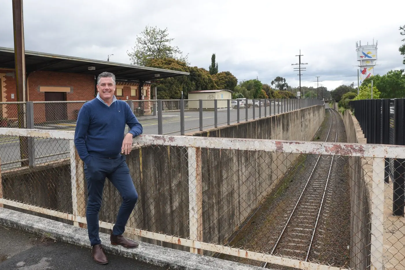 MAJOR WORKS APPROVED: Mayor Dean Rees stands at an area of the Wangaratta Railway Station that will be completely reworked, including the relocation of the eastern track to run parallel with the western track. PHOTO: Kurt Hickling Id:32969