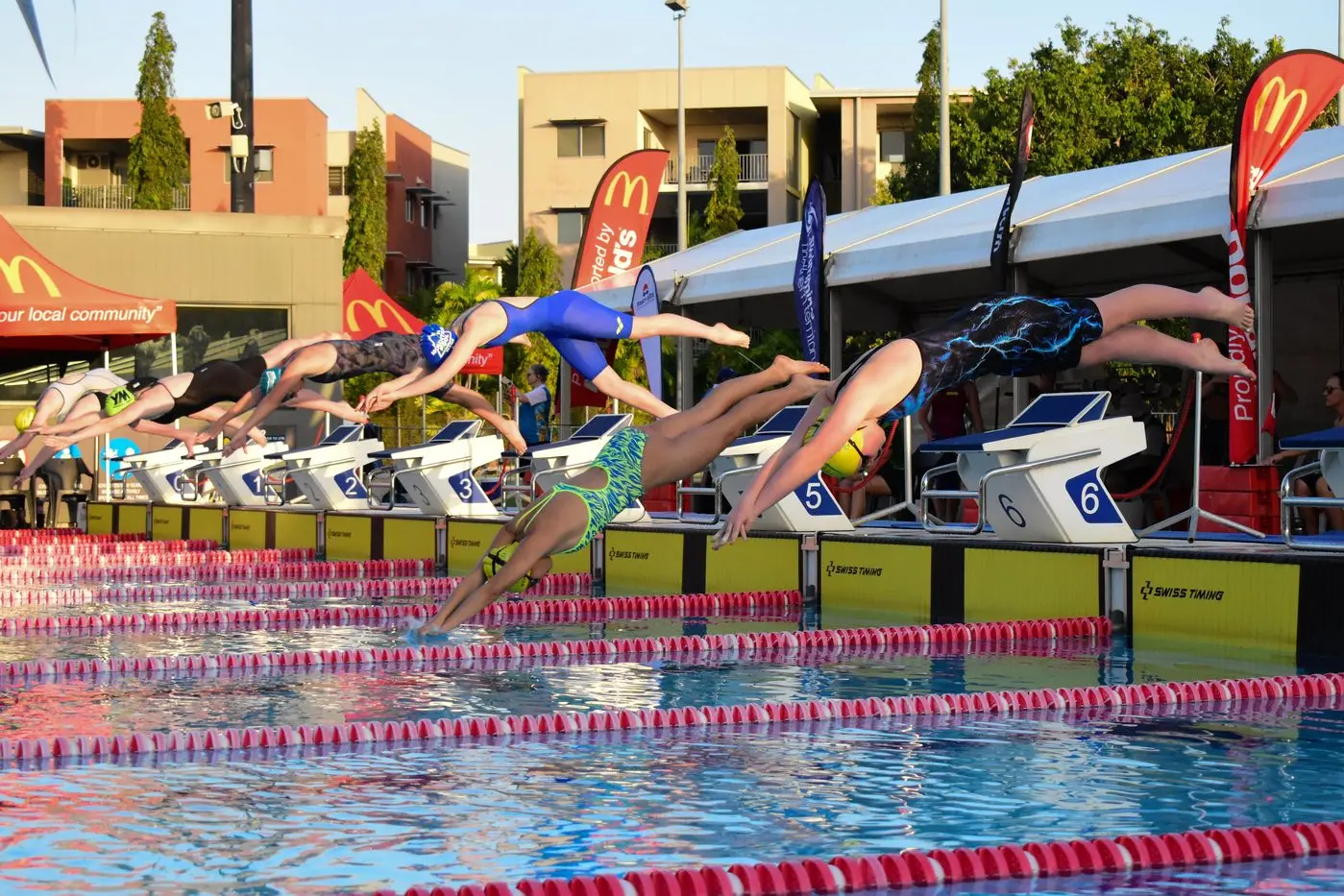 AND THEY\\'RE OFF: Wangaratta Amateur Swimming Club\\'s Nina Fortaliza and Alice Colson (closest to frame) make fast starts in one of their 20 plus events swam over four bumper days at the country swimming nationals held in Darwin. PHOTO: Josh Dillon