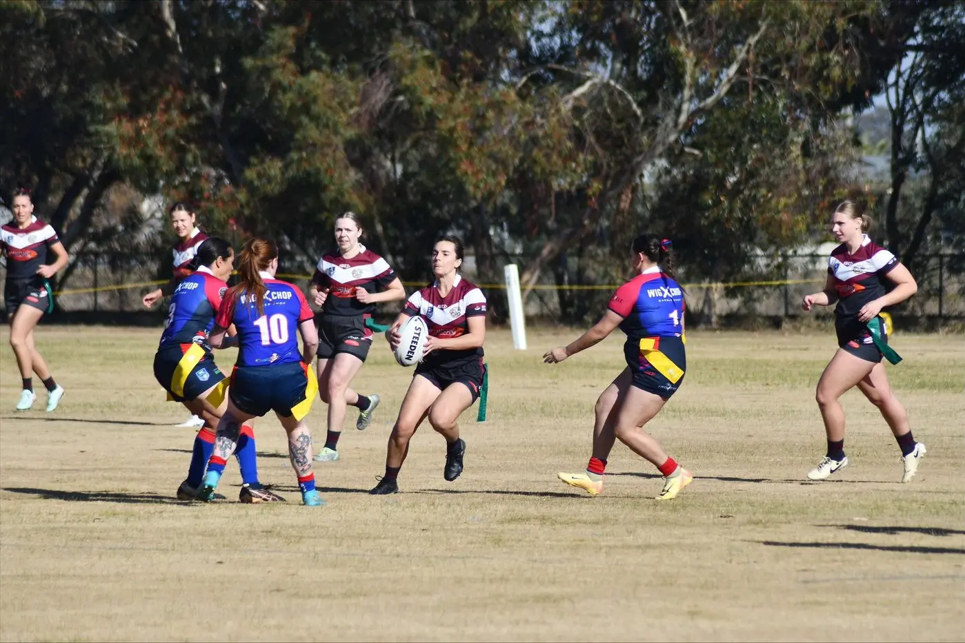 IRON WALL: Sally Kaiwai, Adelaide Fitzpatrick, and Tiana Stuart on the defence. PHOTO: Lisa Clancy (CSU Mud Dogs)