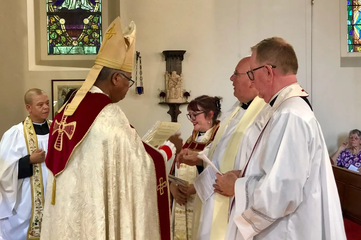 NEW ROLES: Anglican Bishop of Wangaratta Clarence Bester (second from left), supported by the Venerable Mario Hendricks (left), collates Benalla\\u2019s Melissa Clark, Rutherglen-Chiltern\\u2019s Scott Jessup and Beechworth-Eldorado\\u2019s Matthew Healy as archdeacons at evensong in Christ Church Beechworth on Sunday. PHOTO: Jamie Kronborg