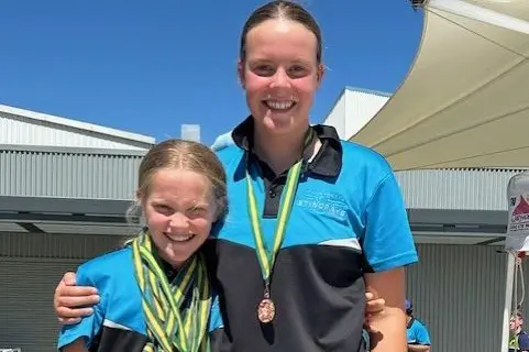 SWIMMING SISTERS: Eliza Looby (right) and sister Alex were among the feature hometown swimmer at Wangaratta\\'s recent Ovens and Murray District Championships