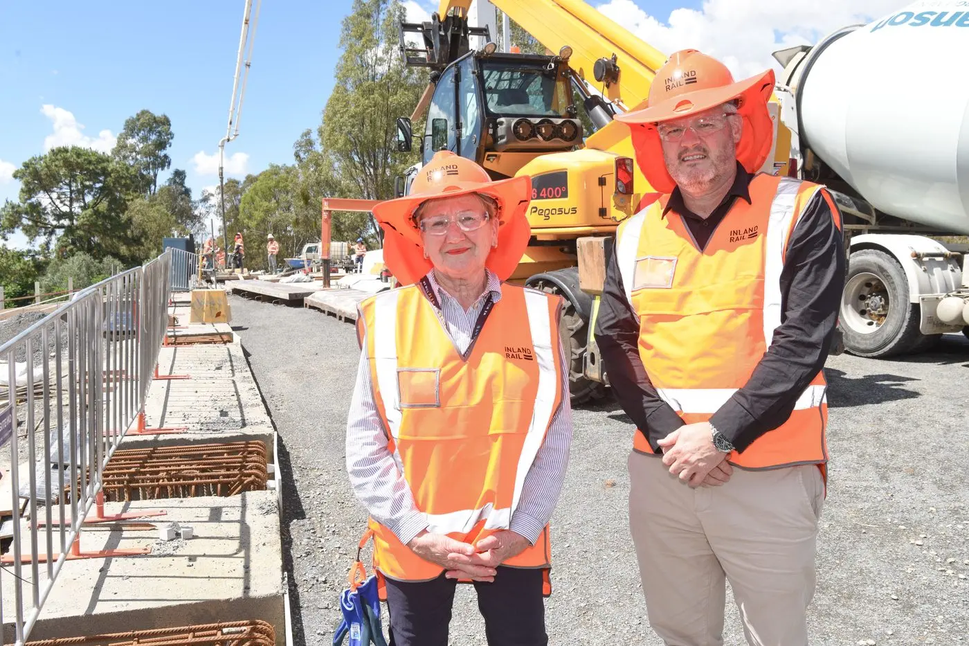 NEAR COMPLETION: Wangaratta Mayor Irene Grant with Inland Rail delivery director B2A, Ed Walker, with the Green Street Bridge in the background. PHOTO: Kurt HIckling