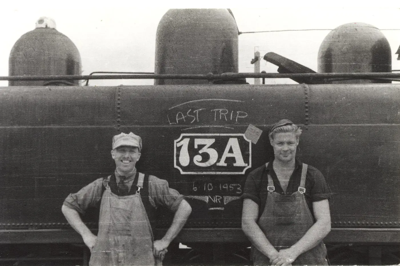 ALL ABOARD: Driver Ocker Creelman and fireman Don Johns are pictured by the Whitfield train 13 A on its last trip on October 6, 1953. Photo: Wal Larsen