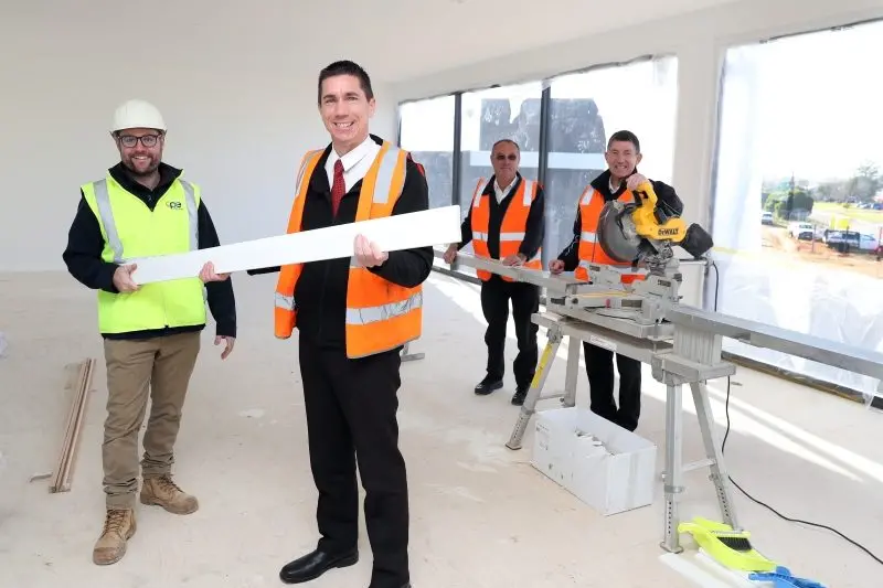 INVESTMENT IN THE FUTURE: CPE Construction project manager Scott Kelly, WCL Management Services managing director Matthew Joyce, Wangaratta depot manager Kevin McMahon, and Wangaratta Coachlines managing director Don Joyce check out the progress on the new Osboldstone Road base.  PHOTO: Kieren Tilly