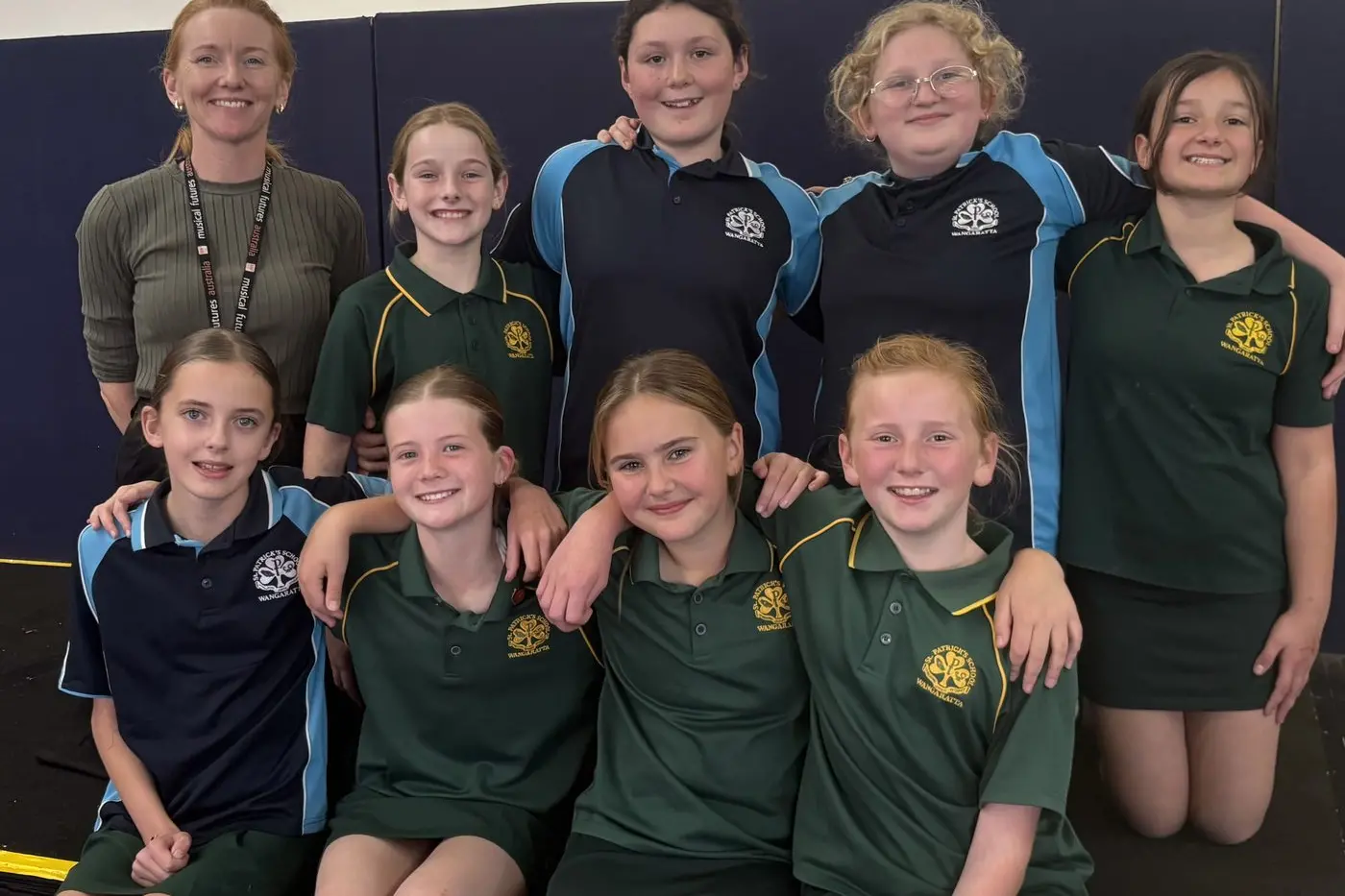 BACKSTAGE PASS: Singing in the Opera Australia production of La Boh\\u00E8me, with guidance from (top, from left) St Patrick\\'s Primary School teacher Brigid Malcolm, will be students Paige Finegan, Ayla Kelly, Charlotte McCall, Evangeline Giglio and (bottom, from left) Josaphine Kilby, Maddalyn May, Sarah Hourigan and Helena Malcolm (absent: Mia Hill and Charlee Wahlert).