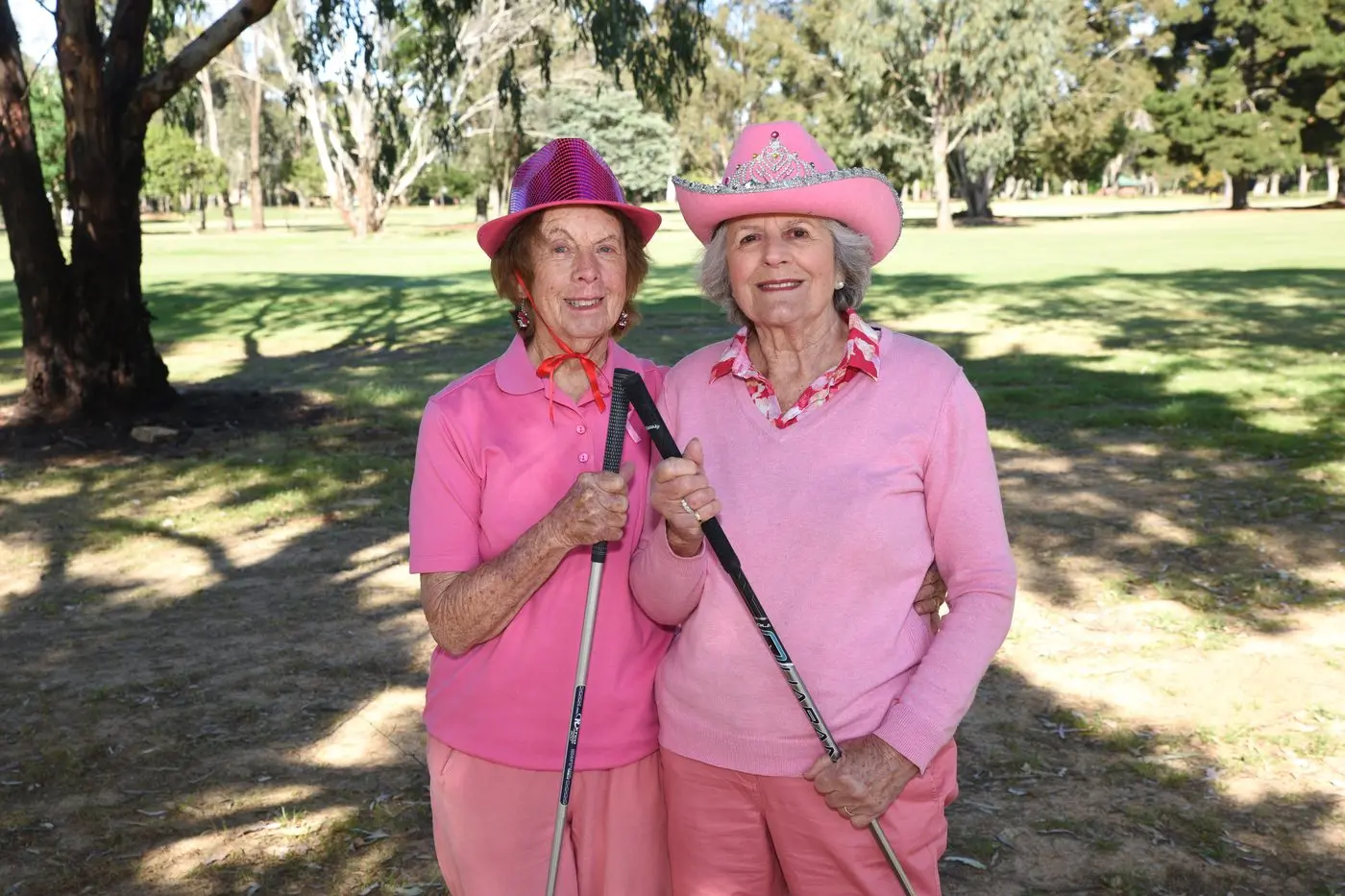PRETTY IN PINK: Marlene Thompson and Rosie Webb were set for ladies day. PHOTOS: Kurt Hickling 