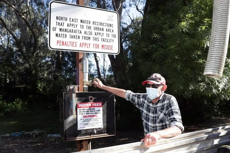 PRECIOUS COMMODITY: Londrigan beef farmer and agriculture committee member Graham Norman at Wangaratta\\u2019s Bickerton Street standpipe. PHOTO: Kieren Tilly
