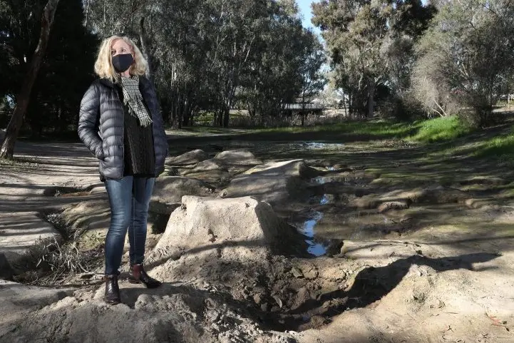 CONCERNED: Wangaratta resident Claire Russell is disturbed by the effect of bike jumps on the natural landscape. \\nPHOTO: Kieren Tilly