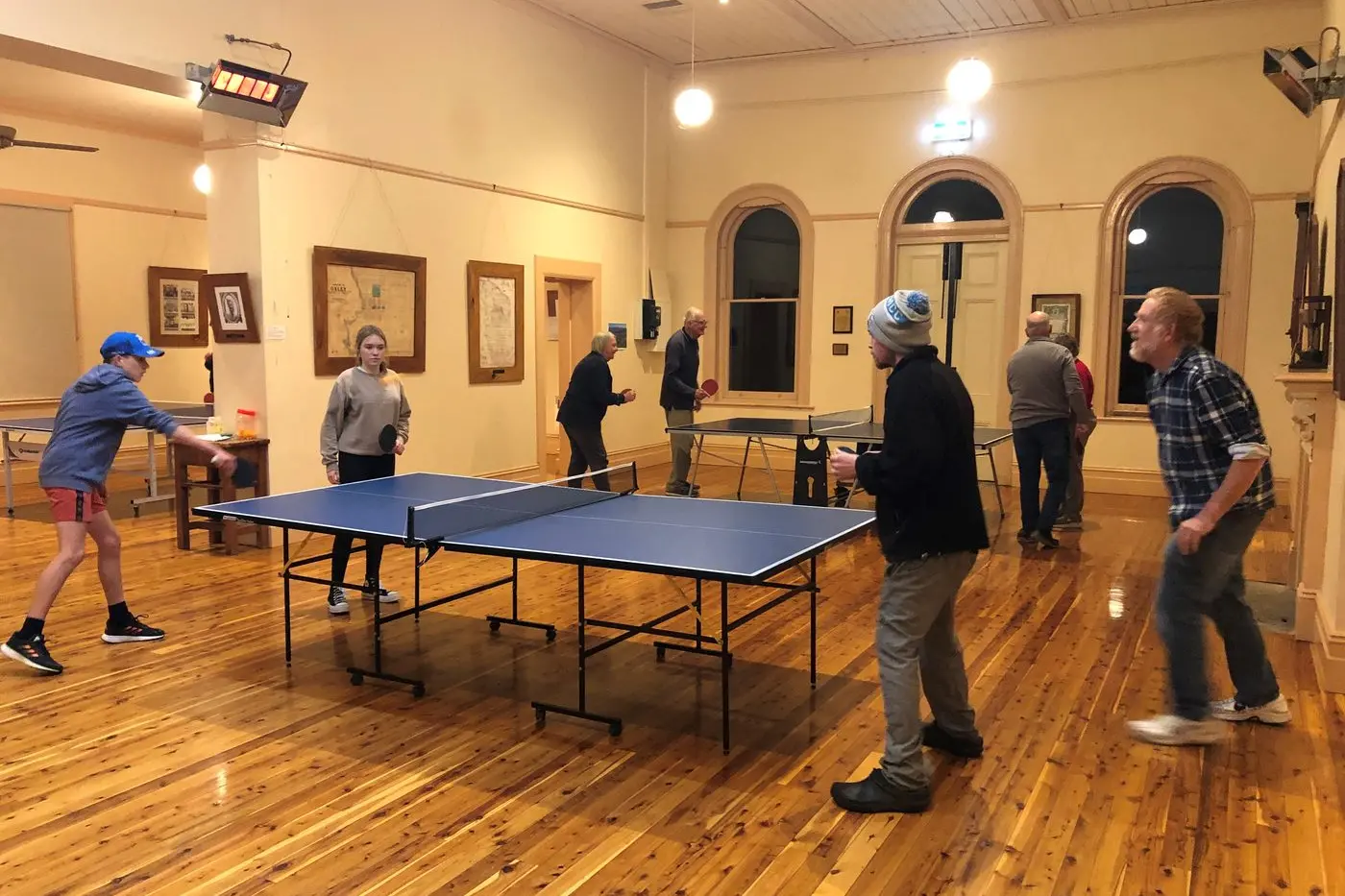 TEAMWORK: (from left) Eamon Mullins and Phoebe Bosley go head\\u2013to\\u2013head with Will Bonwick and Richard Morgan at Monday\\'s table tennis night at the Oxley hall. PHOTO: Jason Mullins Id:27497