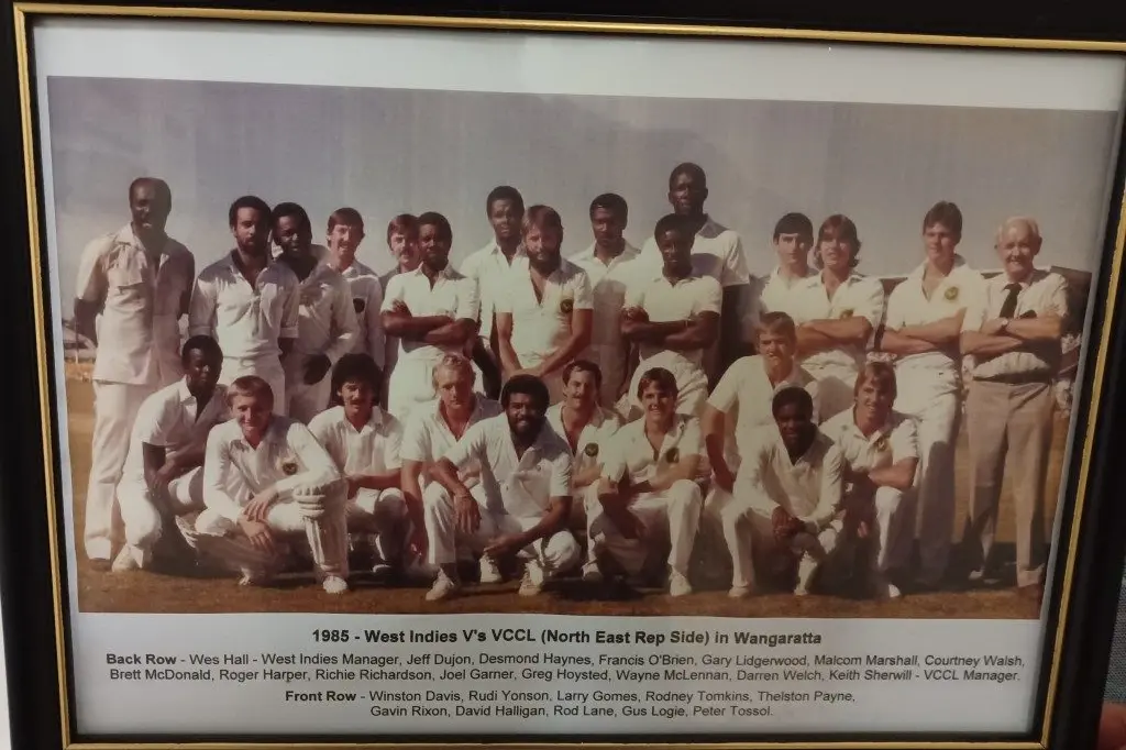 HISTORIC ENCOUNTER: The teams from the Wangaratta match. Note Greg, who is six foot two, standing to the right of Barbadian behemoth Joel Garner. Id:34249