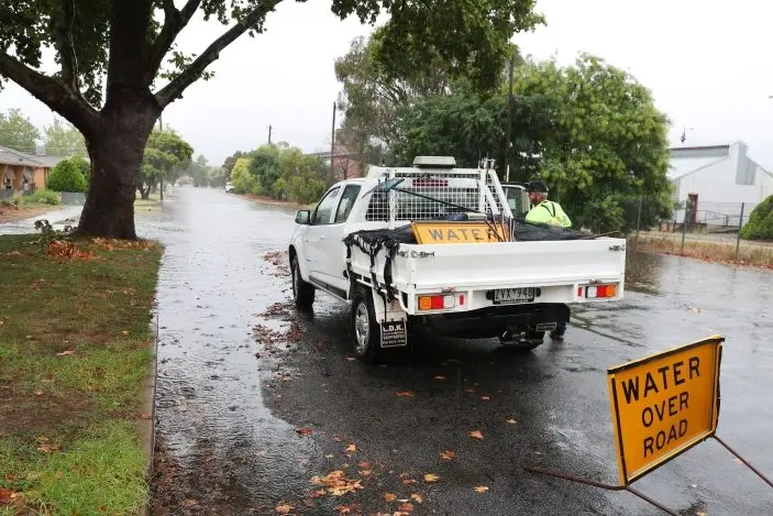 SPLISH SPLASH: Rain last week on Spearing Street had residents return to a familiar sight. PHOTO: Kieren Tilly
