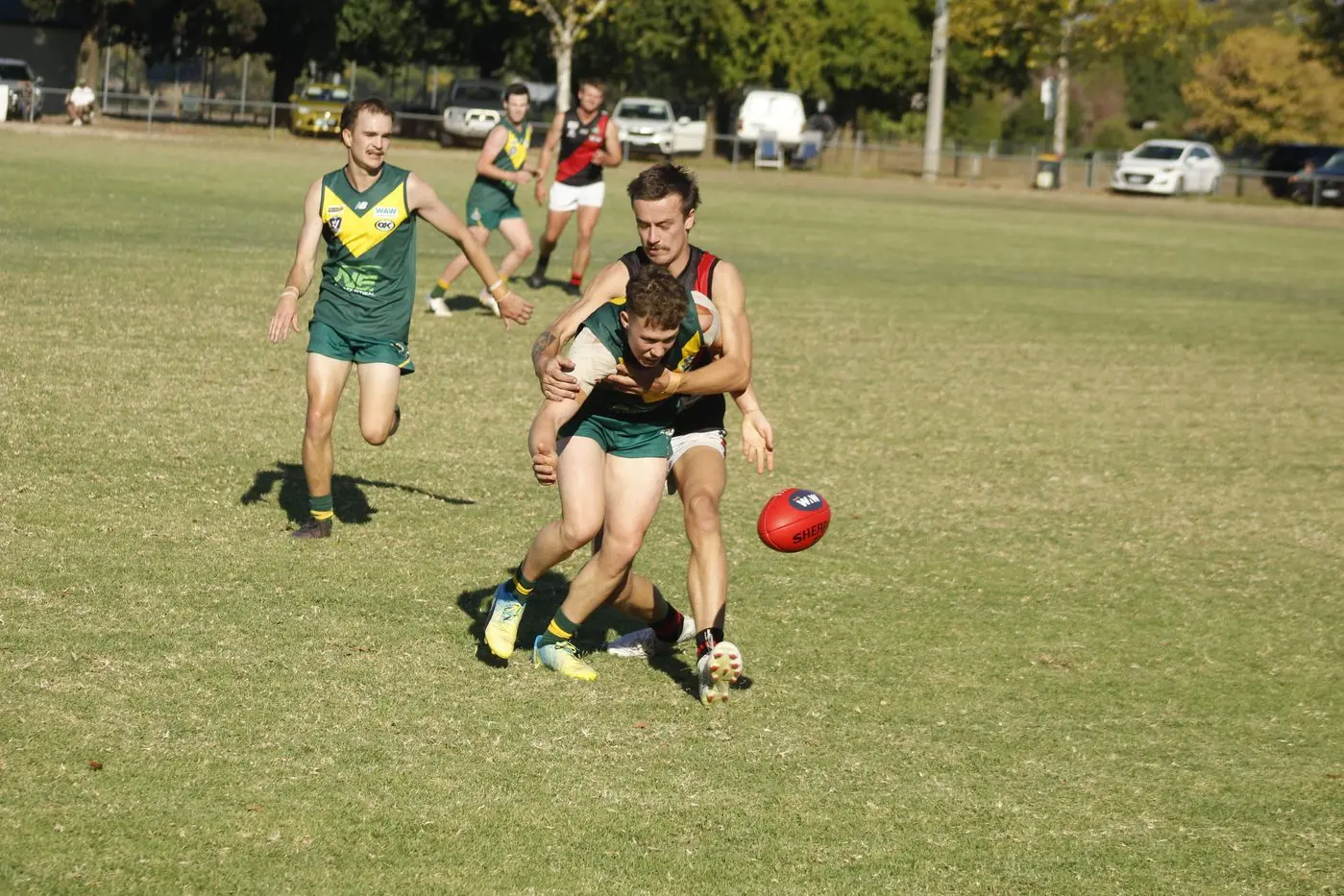 CAUGHT: Zac Tanner runs down Moyhu\\'s Liam Cook in the Bombers\\' 154-point win. PHOTO: Bailey Zimmermann