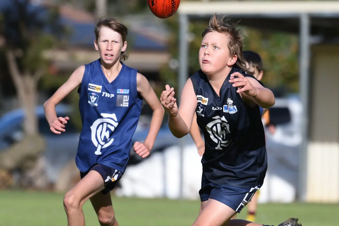 EYEING THE NEW LOOK: While the new jumpers for the College Football Club next year will be of the same design, numbers such as Tate Llewellyn\\'s (back) 72 will be a thing of the past, with funding helping the club order three new sets of jumpers from numbers one to 30 for all grades.  Id:41854