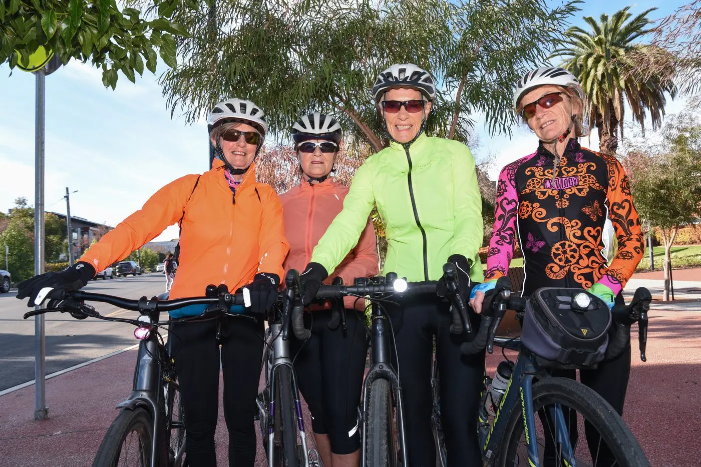 GO BRIGHT: Local cyclists (from left) Jenny Dickinson, Joy Ramsey, Gyll Lambert and Ann Ford use lights and fluorescent clothing to ensure they can be seen by other road users, especially in the darker winter months. PHOTO: Kurt Hickling