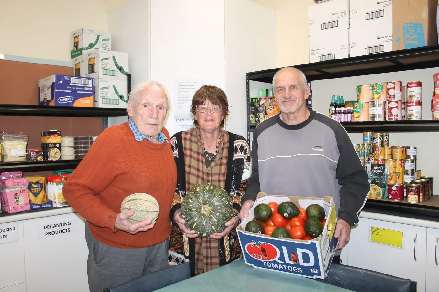 TEAM EFFORT: Open Door Neighbourhood House volunteers Bruce Noylor, Yolanda Vanherrikhuyzen and Geoff Miller are part of the effort to support local community members. 
