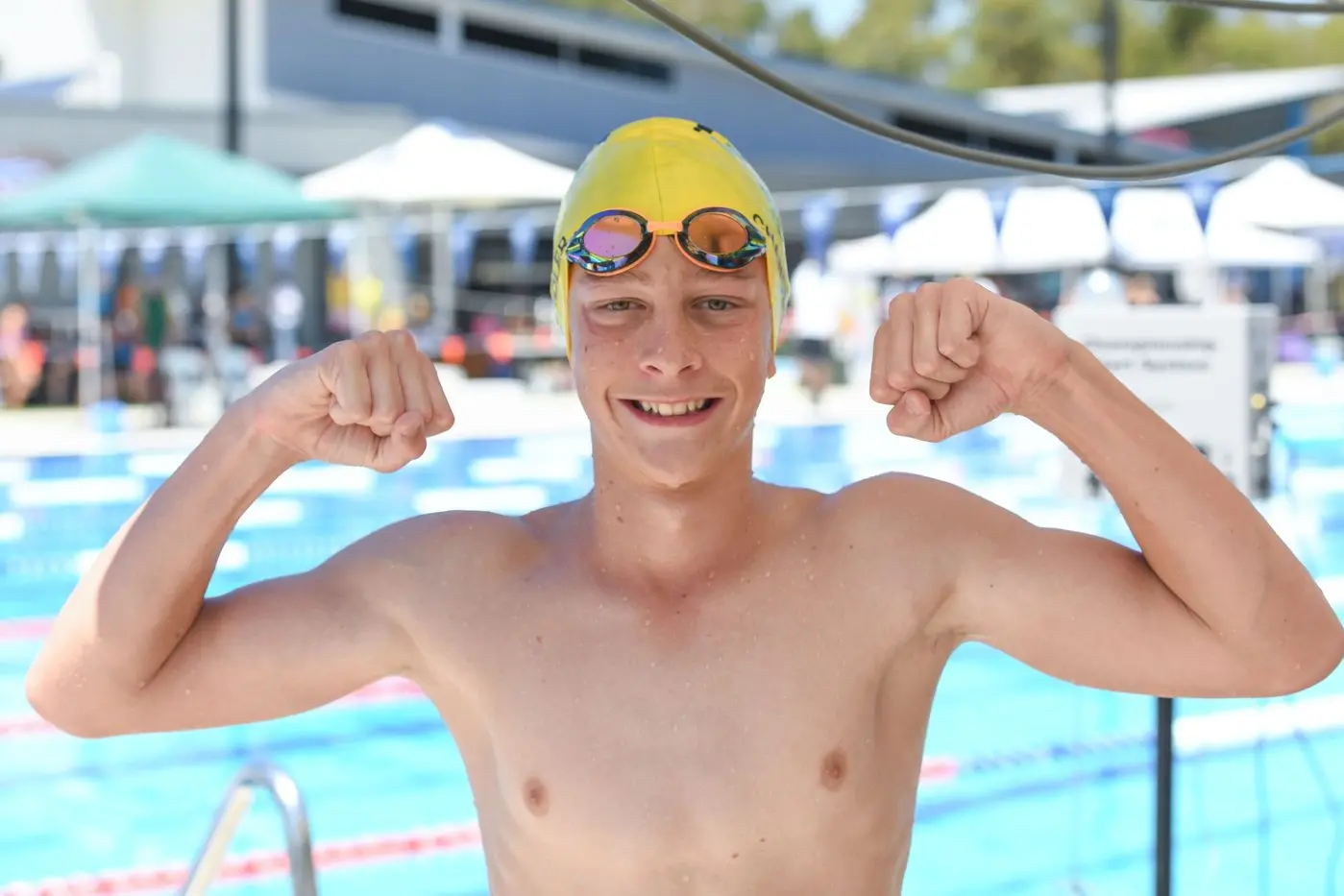 HUGE MEET: Harry Chandler was one happy swimmer after his silver medal placing in the boys 100m butterfly, to go with his six finals placings in his program. PHOTOS: Kurt Hickling